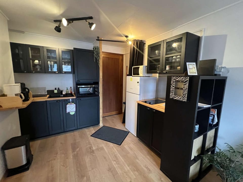 Kitchen or kitchenette, stove