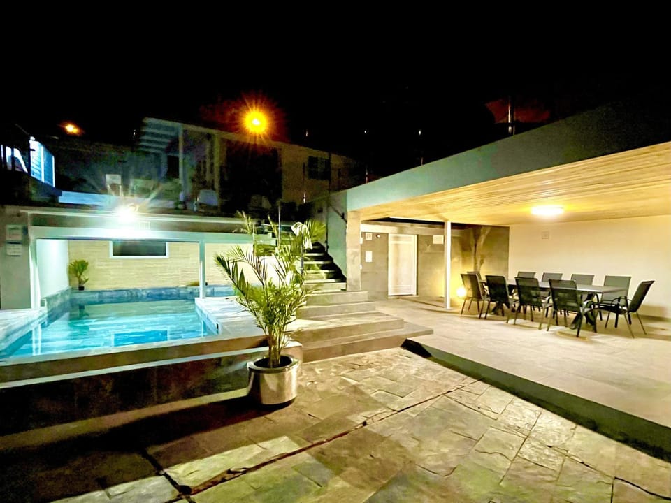 Property building, Living room, Swimming pool