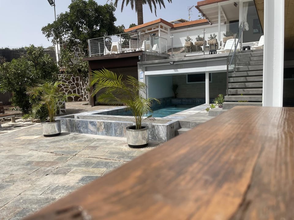 Property building, Living room, Swimming pool