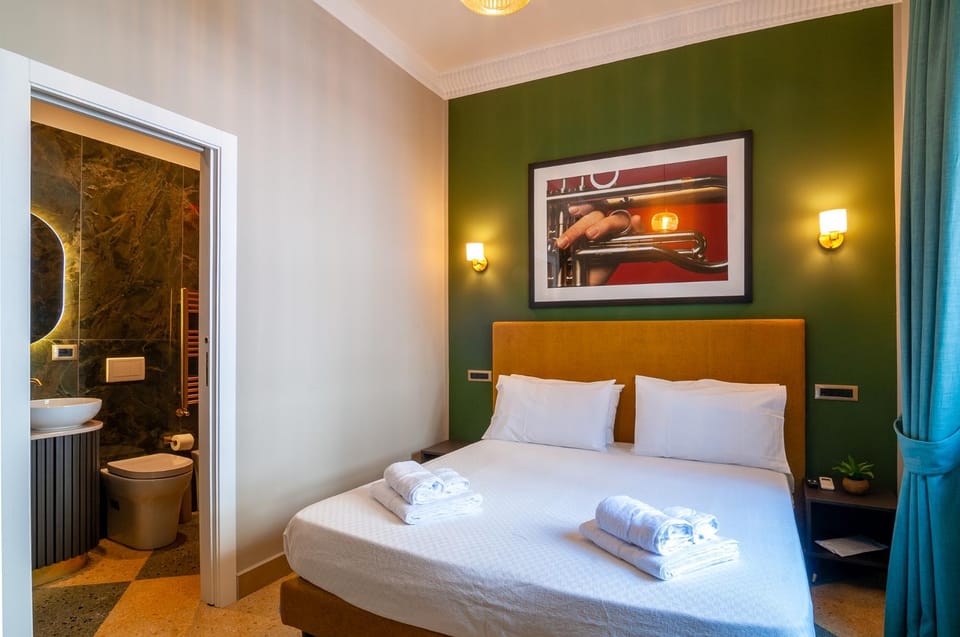 Toilet, Bed, Bathroom, Photo of the whole room, towels