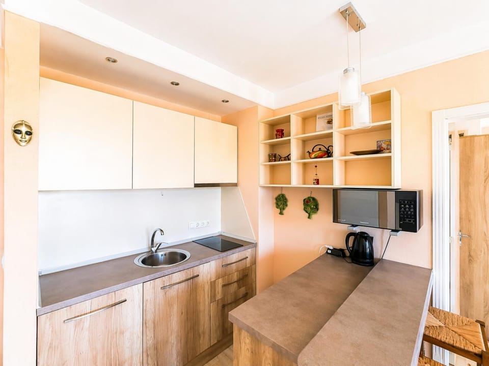 Kitchen or kitchenette, stove