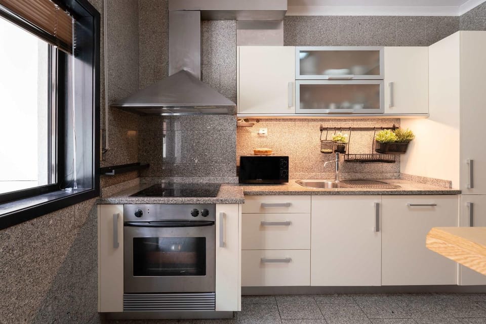 Kitchen or kitchenette, oven, stove