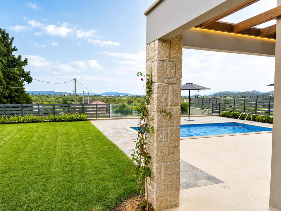 Property building, Day, Natural landscape, Garden, Garden view, Pool view, Swimming pool, sunbed