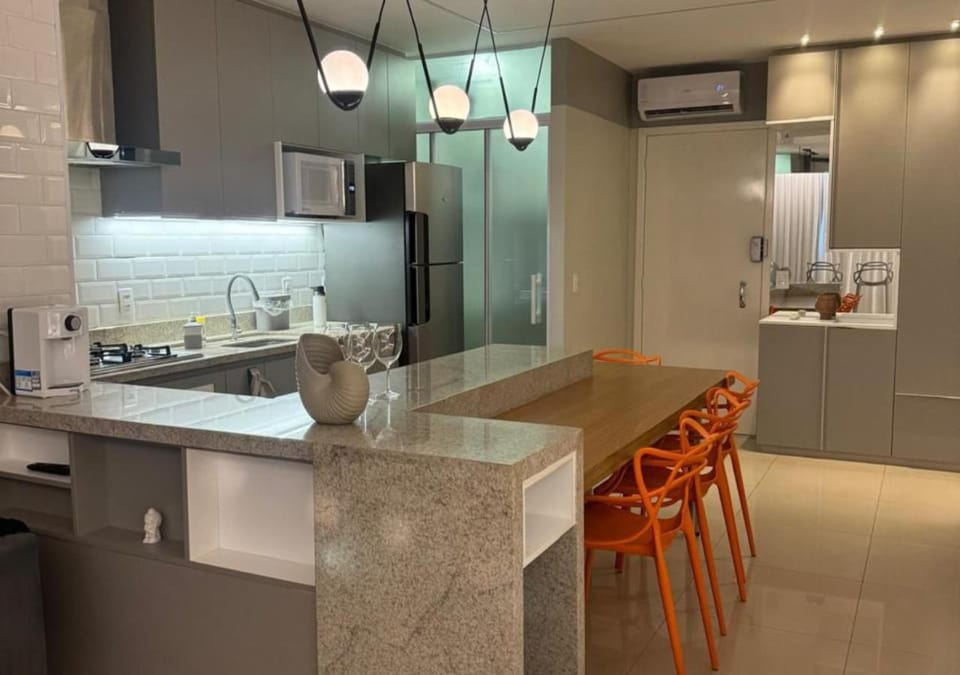 Kitchen or kitchenette, stove, air conditioner