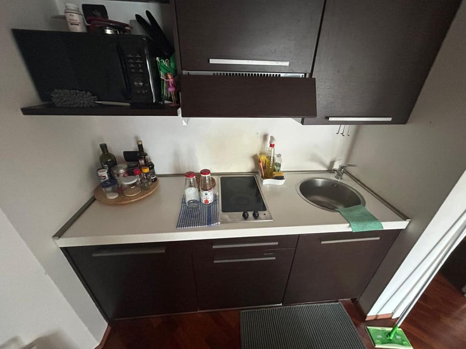 Kitchen or kitchenette, stove
