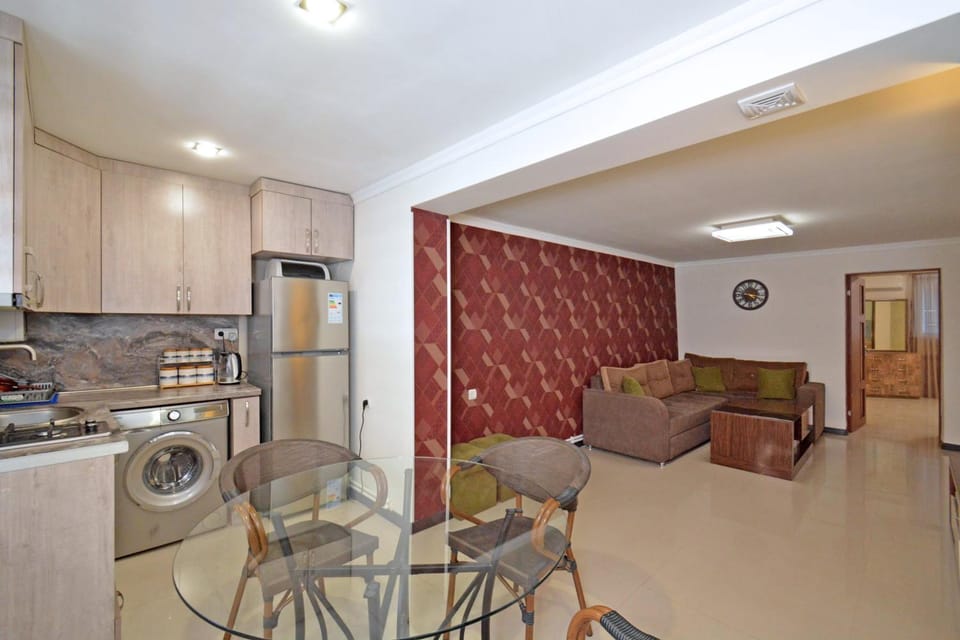 Kitchen or kitchenette, Seating area, oven, stove, washing machine