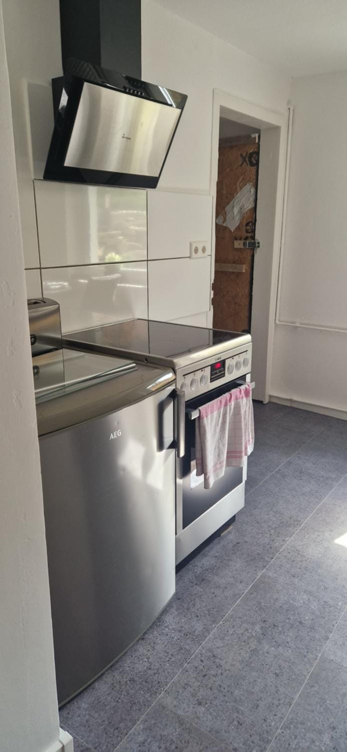 Kitchen or kitchenette, stove, kitchen