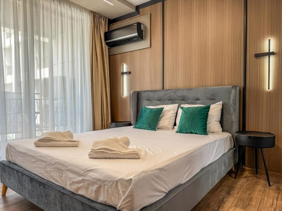 Bed, Bedroom, towels, wardrobe, air conditioner
