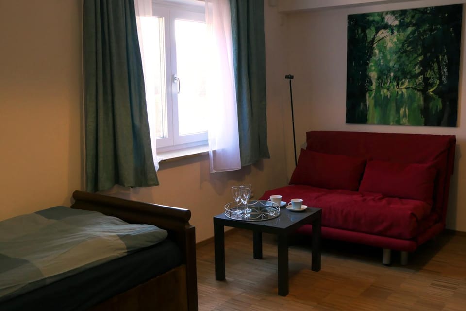 Bed, Living room, Seating area, Bedroom