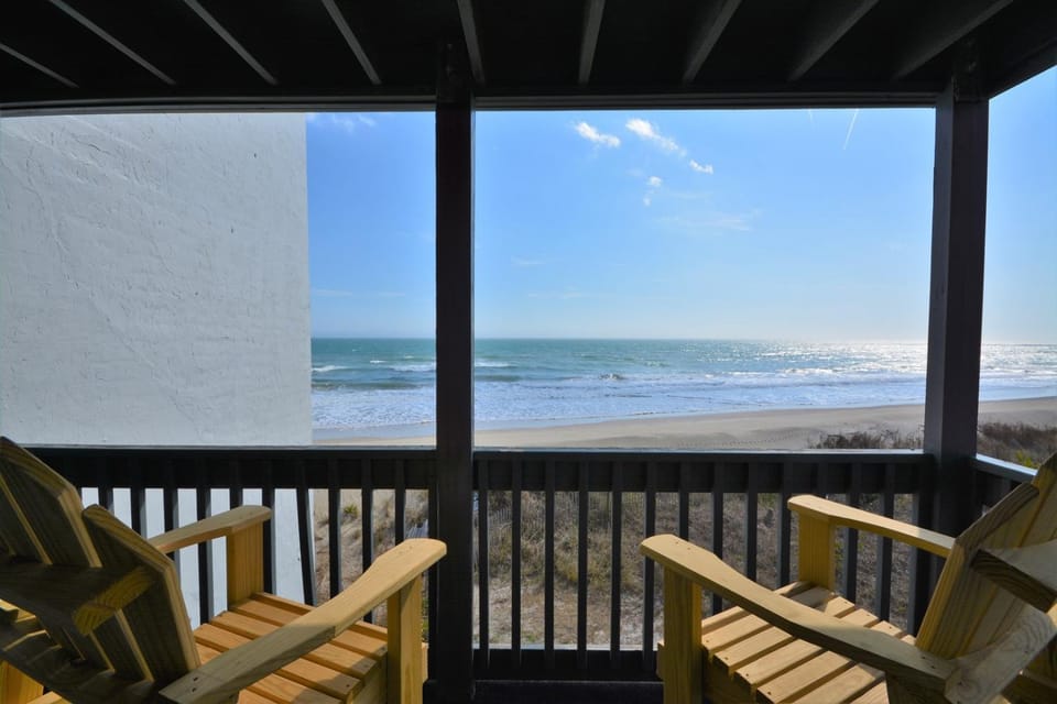 Experience oceanfront living at Shipwatch Villas 1209 in North Topsail Beach! House in North Topsail Beach