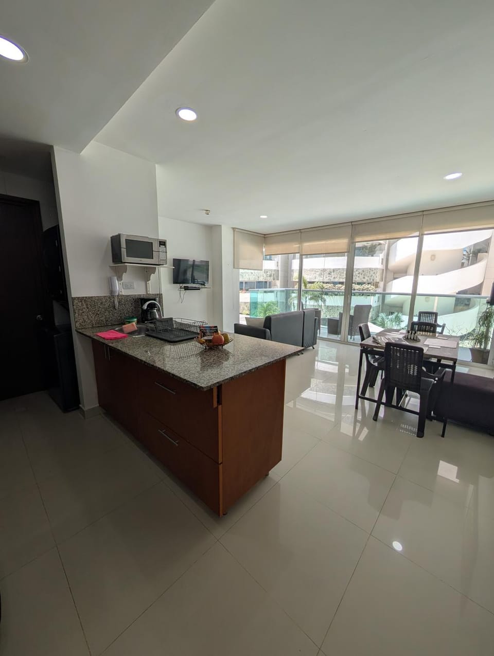 TV and multimedia, Balcony/Terrace, Living room, Dining area, microwave, laundry, washing machine, dryer, kitchen