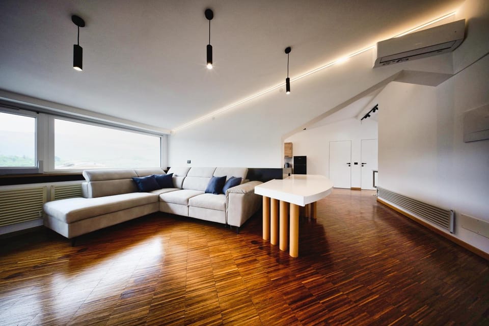 Bed, TV and multimedia, Living room, Seating area, air conditioner