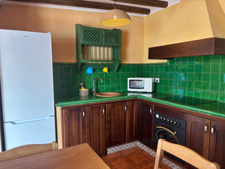 Kitchen or kitchenette, microwave, oven, stove, stove, kitchen, kitchen