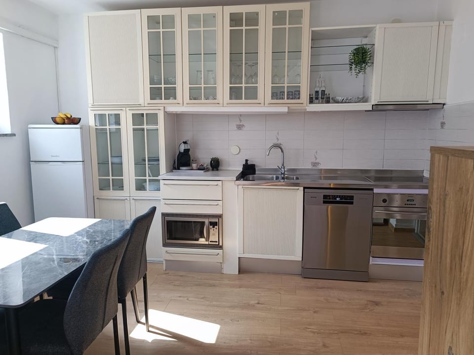 Dining area, dishwasher, microwave, oven, kitchen