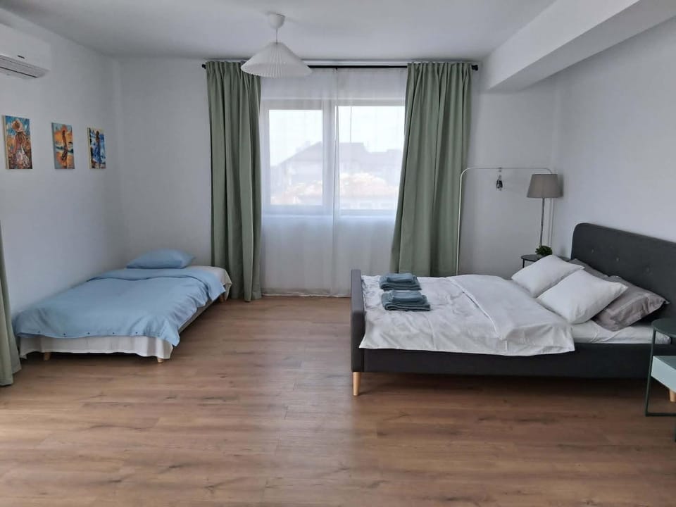 Bed, Photo of the whole room, Bedroom, towels, air conditioner