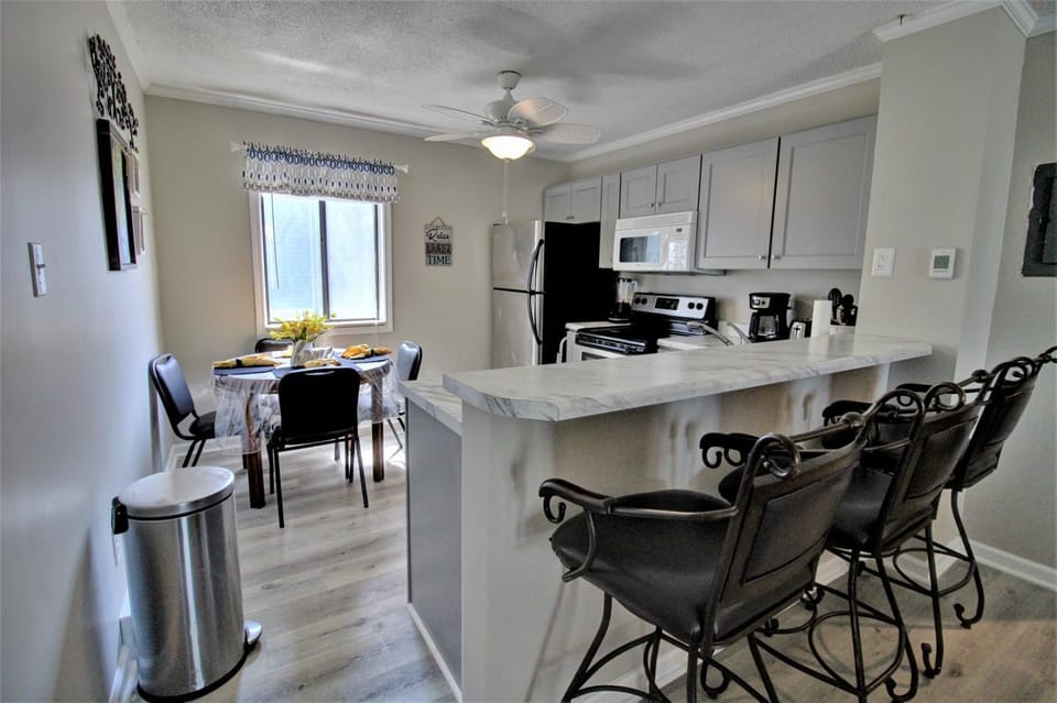 Enjoy oceanfront views in this cute 2-bedroom condo at North Topsail Beach House in North Topsail Beach