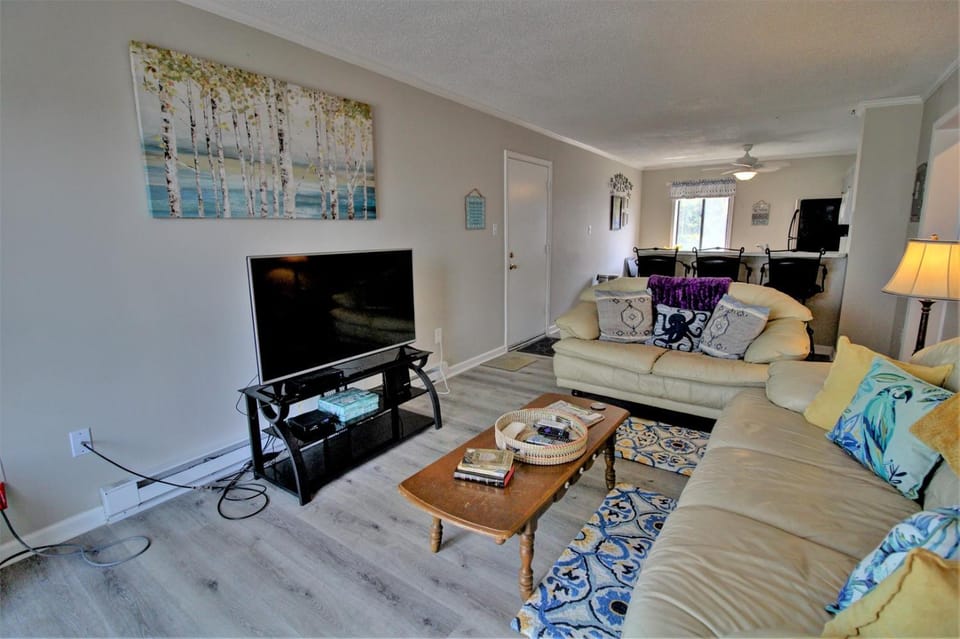 Enjoy oceanfront views in this cute 2-bedroom condo at North Topsail Beach House in North Topsail Beach