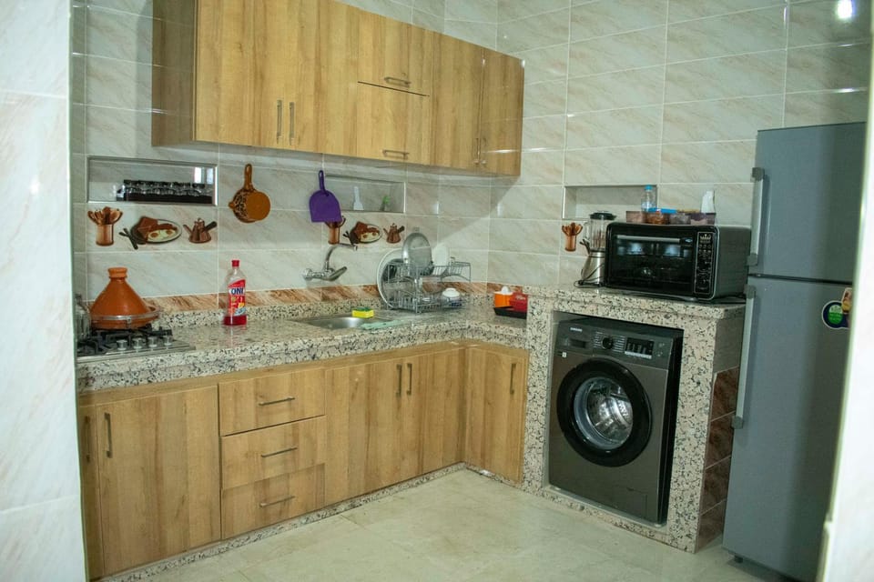 Kitchen or kitchenette, dishwasher, oven, stove, washing machine, kitchen