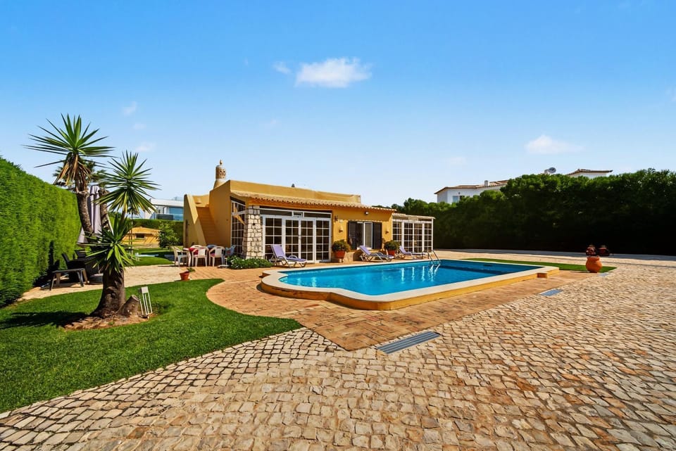 Property building, Living room, Swimming pool