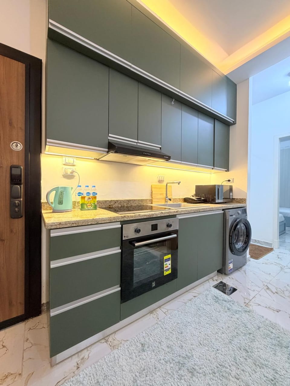 Kitchen or kitchenette, washing machine