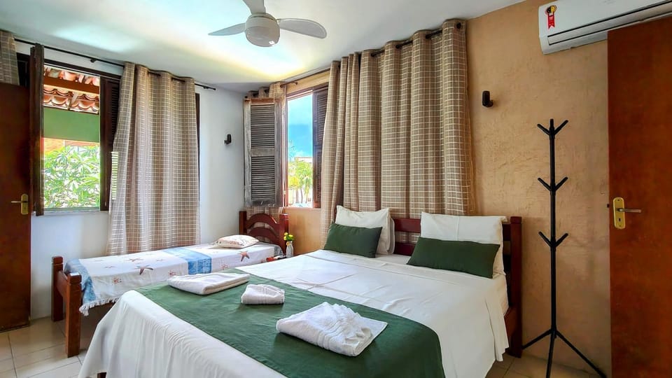 Bed, Photo of the whole room, towels, air conditioner
