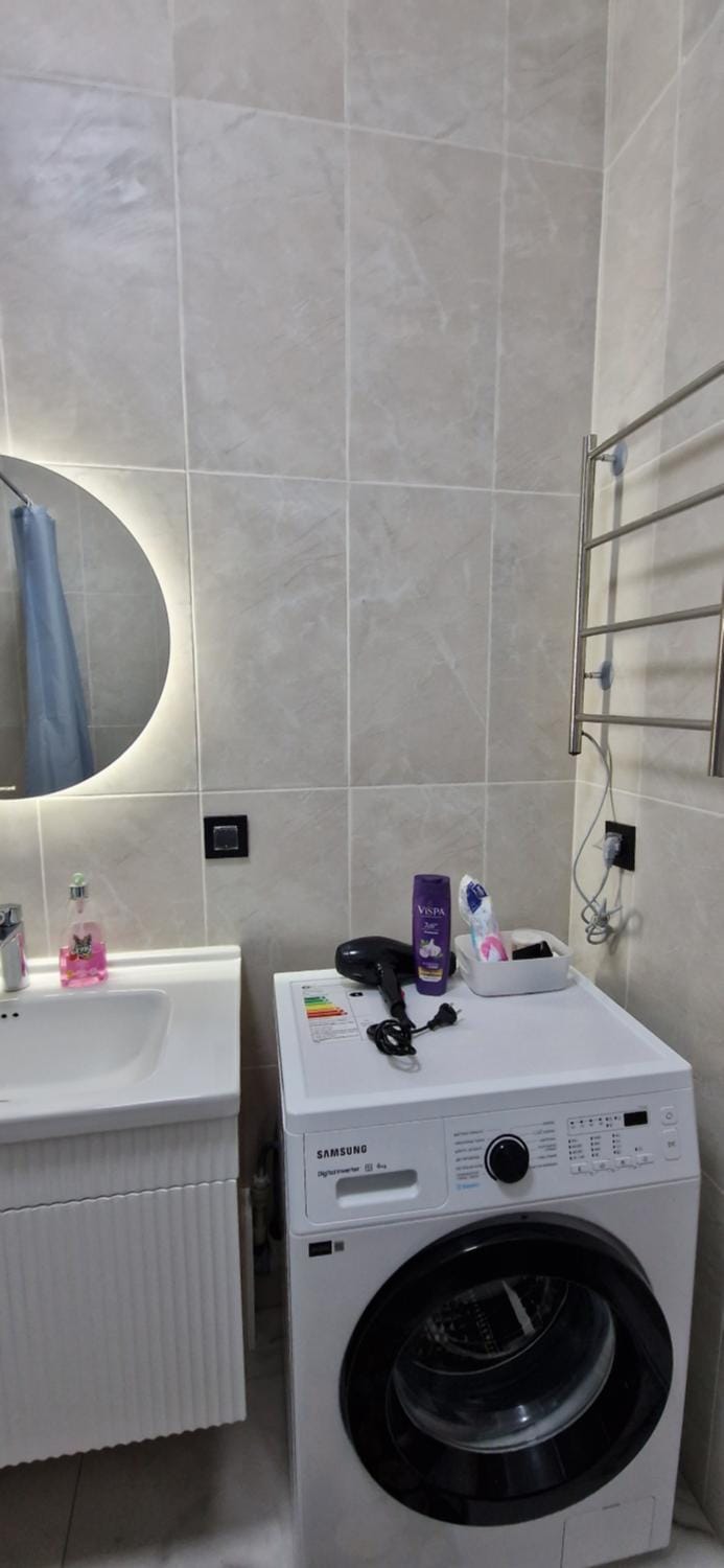 Bathroom, towels, washing machine, dryer