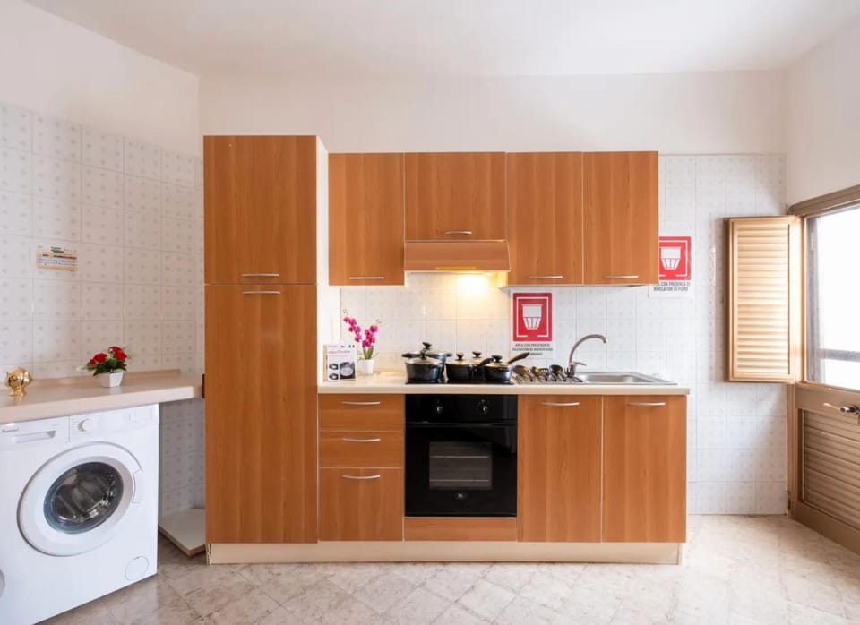 microwave, oven, laundry, washing machine, kitchen