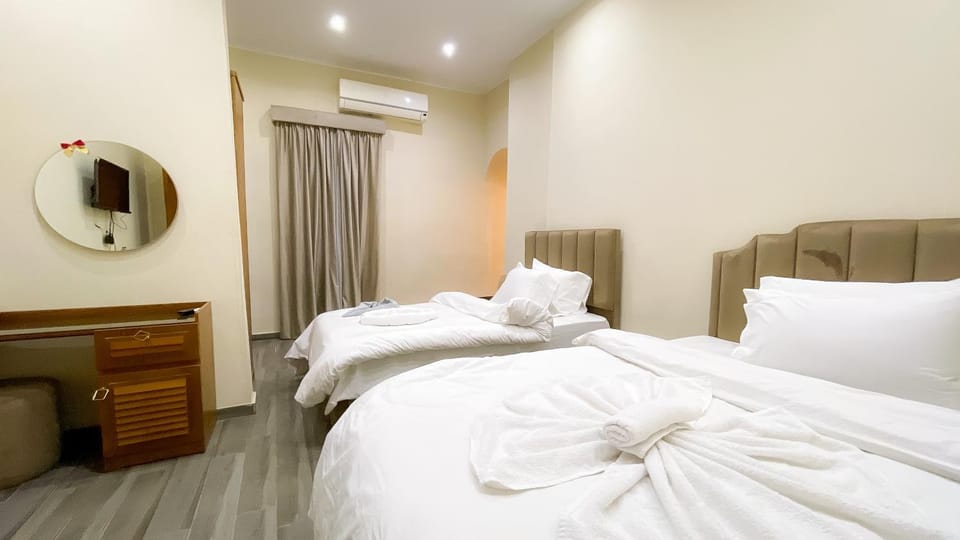 Bed, Photo of the whole room, Bedroom, towels, air conditioner