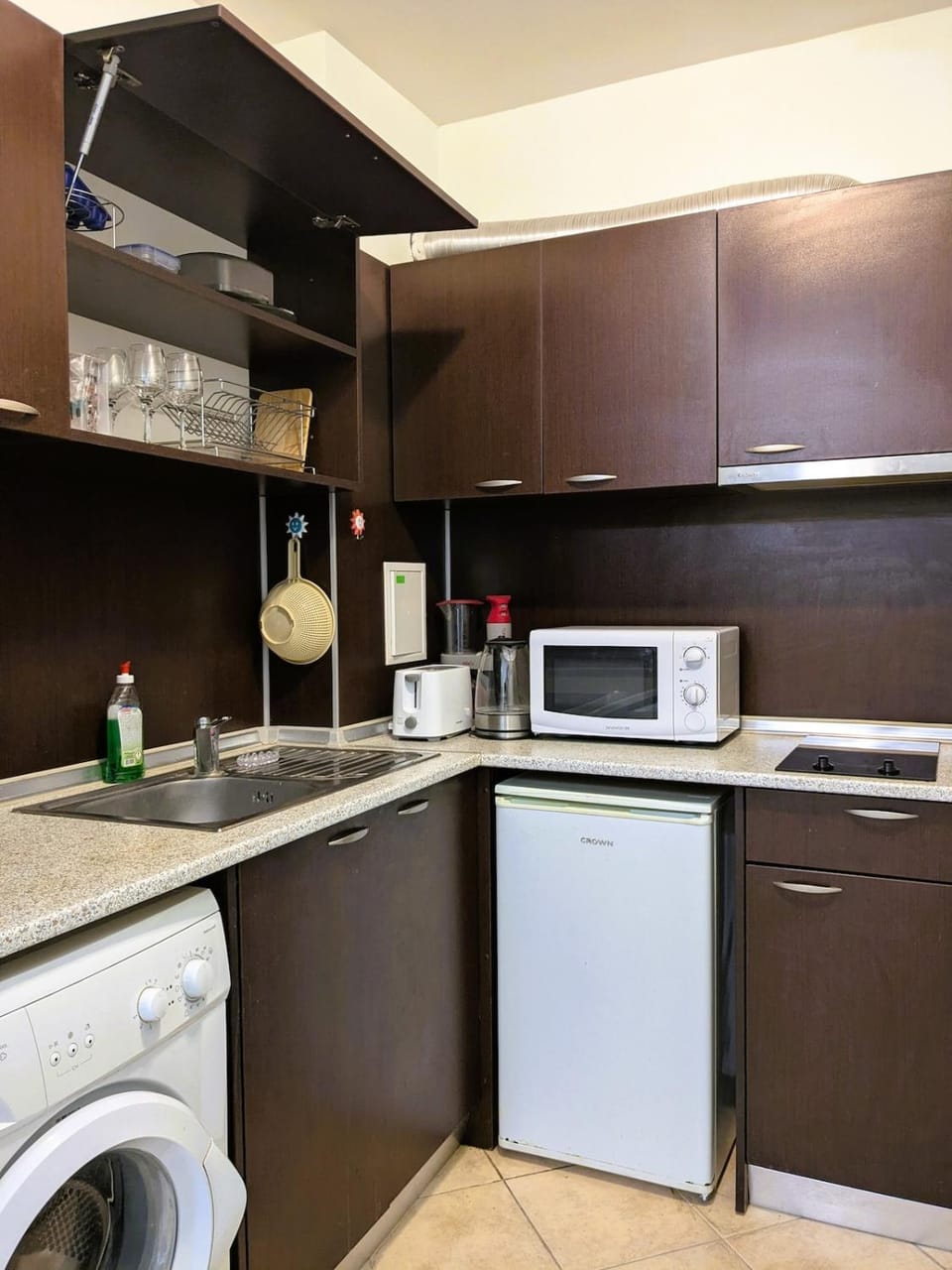 Kitchen or kitchenette, toaster, washing machine