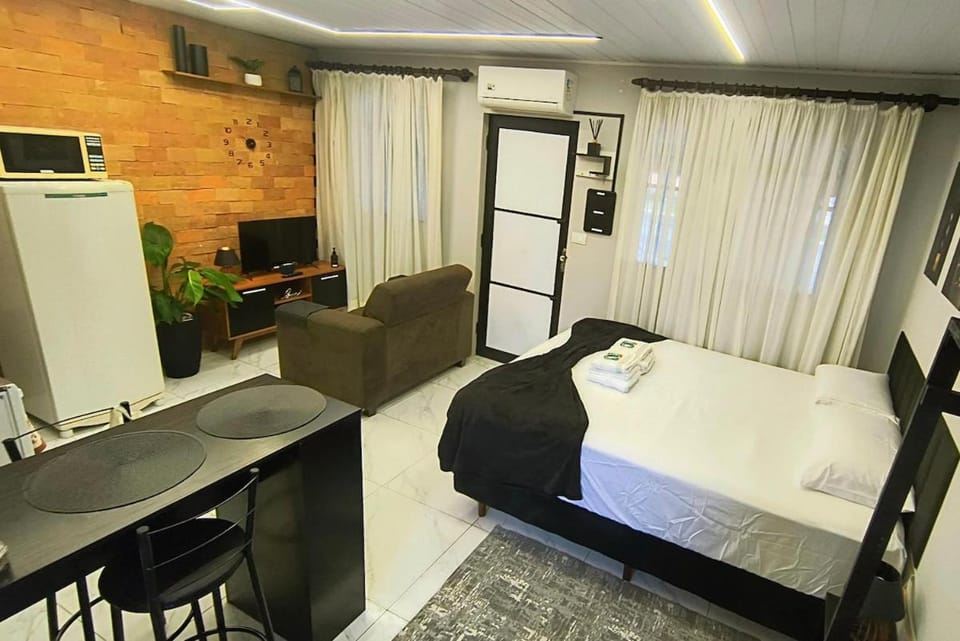 Loft moderno com ar-condicionado 1km da rodoviária Apartment in State of Paraná