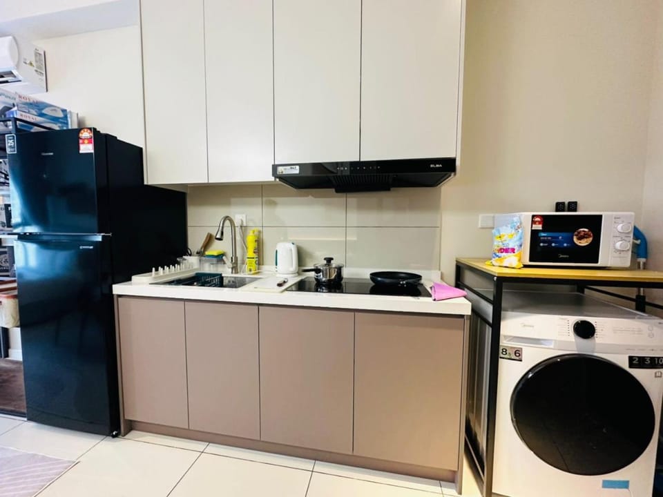 Kitchen or kitchenette, dishwasher, oven, stove, washing machine, dryer