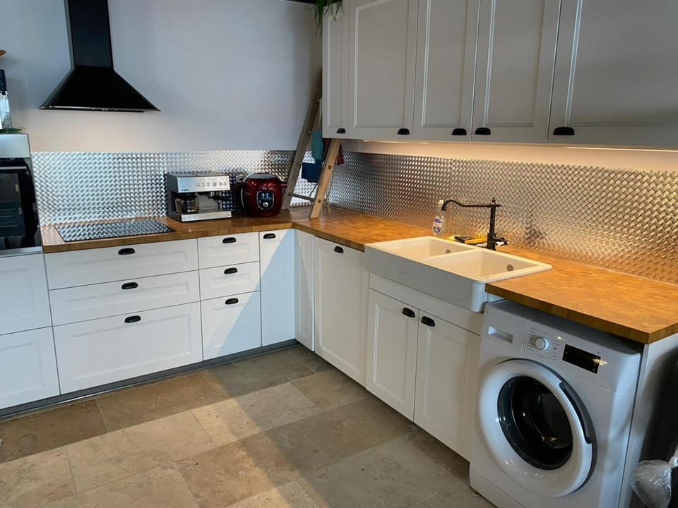 Kitchen or kitchenette, dishwasher, oven, pet friendly, stove, toaster, washing machine, dryer