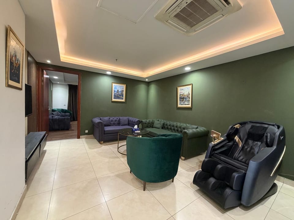 Premium 1 BHK Apartment with Massage Chair Goldcrest Apartment in Lahore