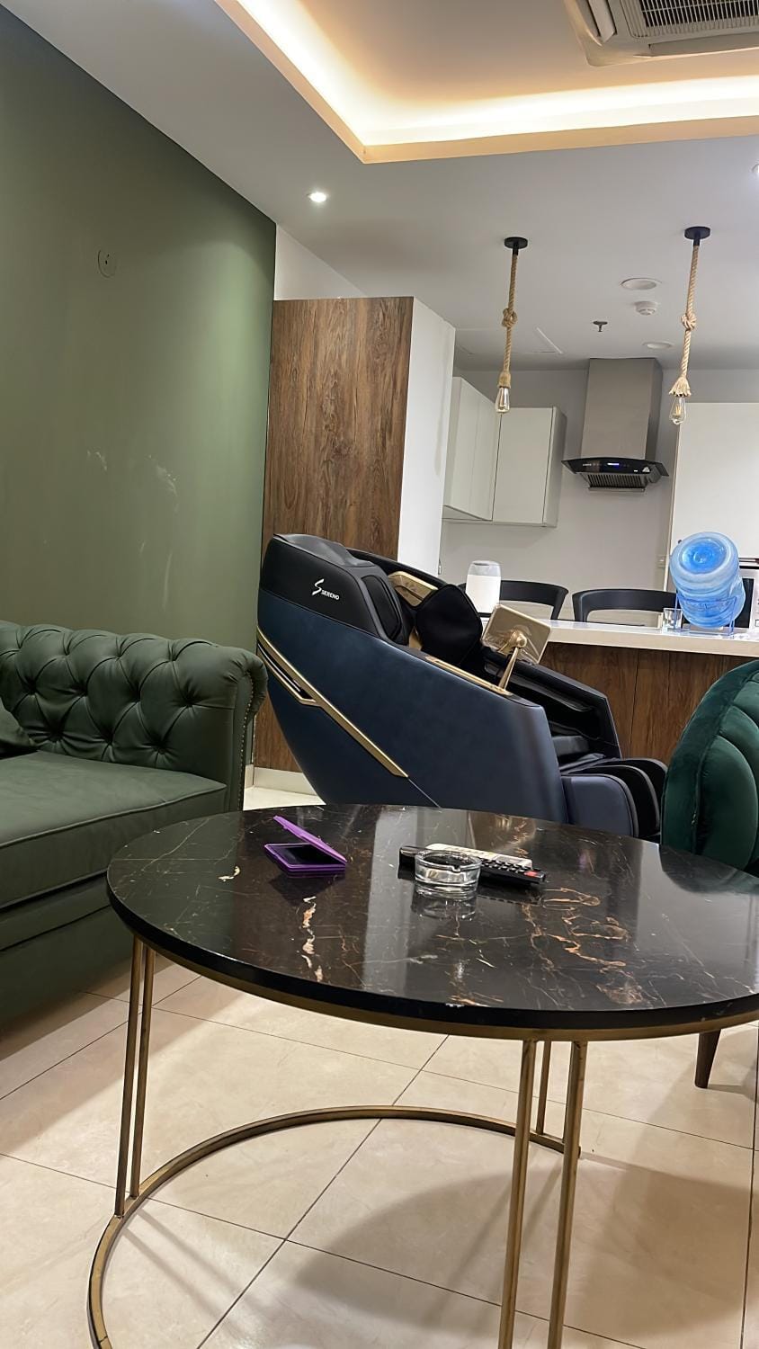 Premium 1 BHK Apartment with Massage Chair Goldcrest Apartment in Lahore