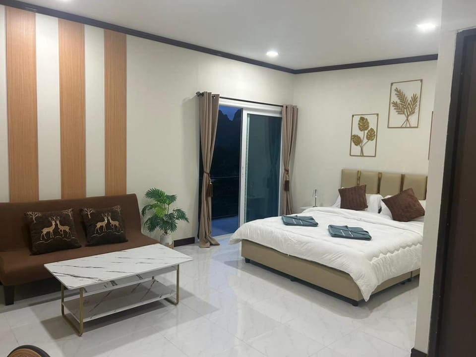 Bed, Seating area, Bedroom, towels
