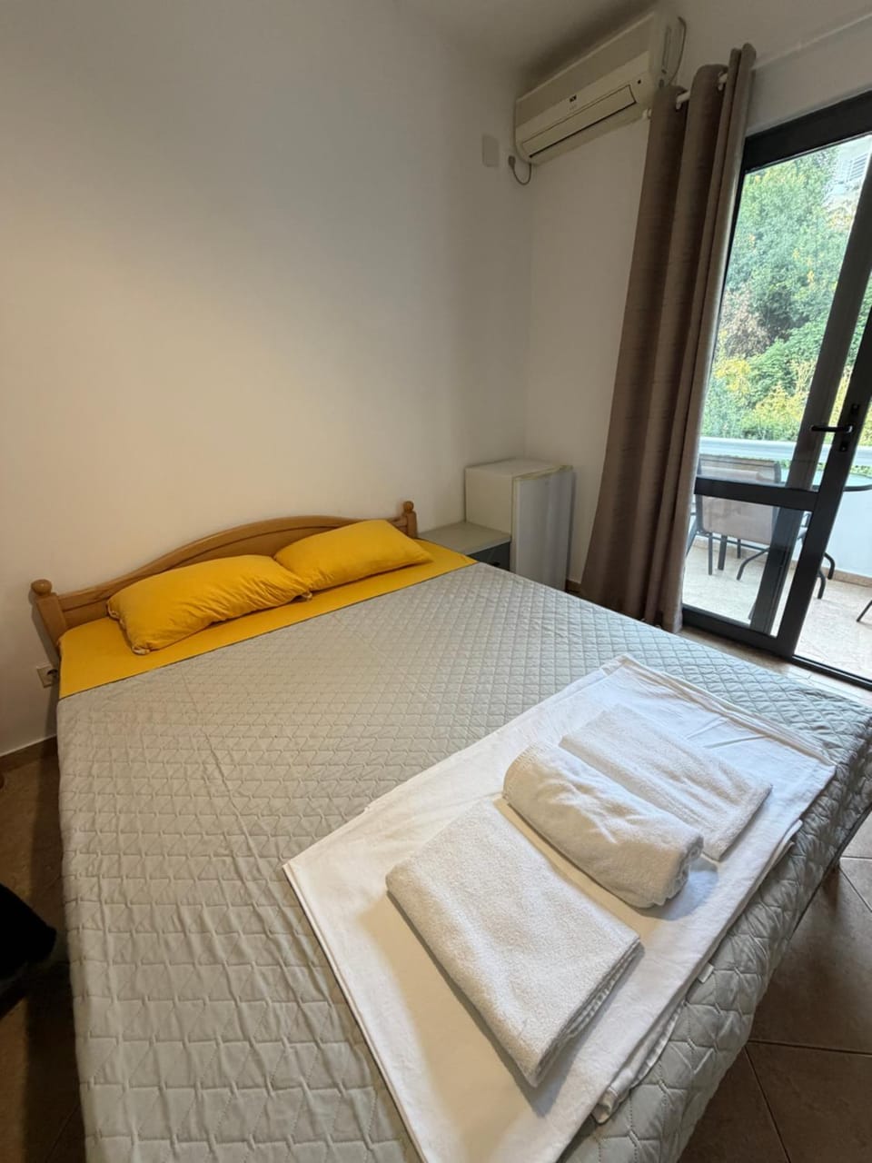 Bed, Photo of the whole room, Bedroom, towels, air conditioner