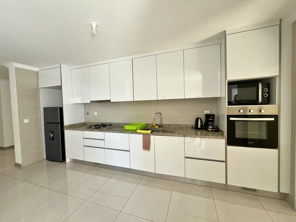 Kitchen or kitchenette, oven