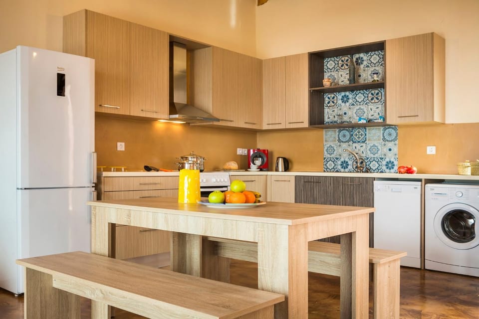 Kitchen or kitchenette, Dining area, oven, stove, washing machine, kitchen