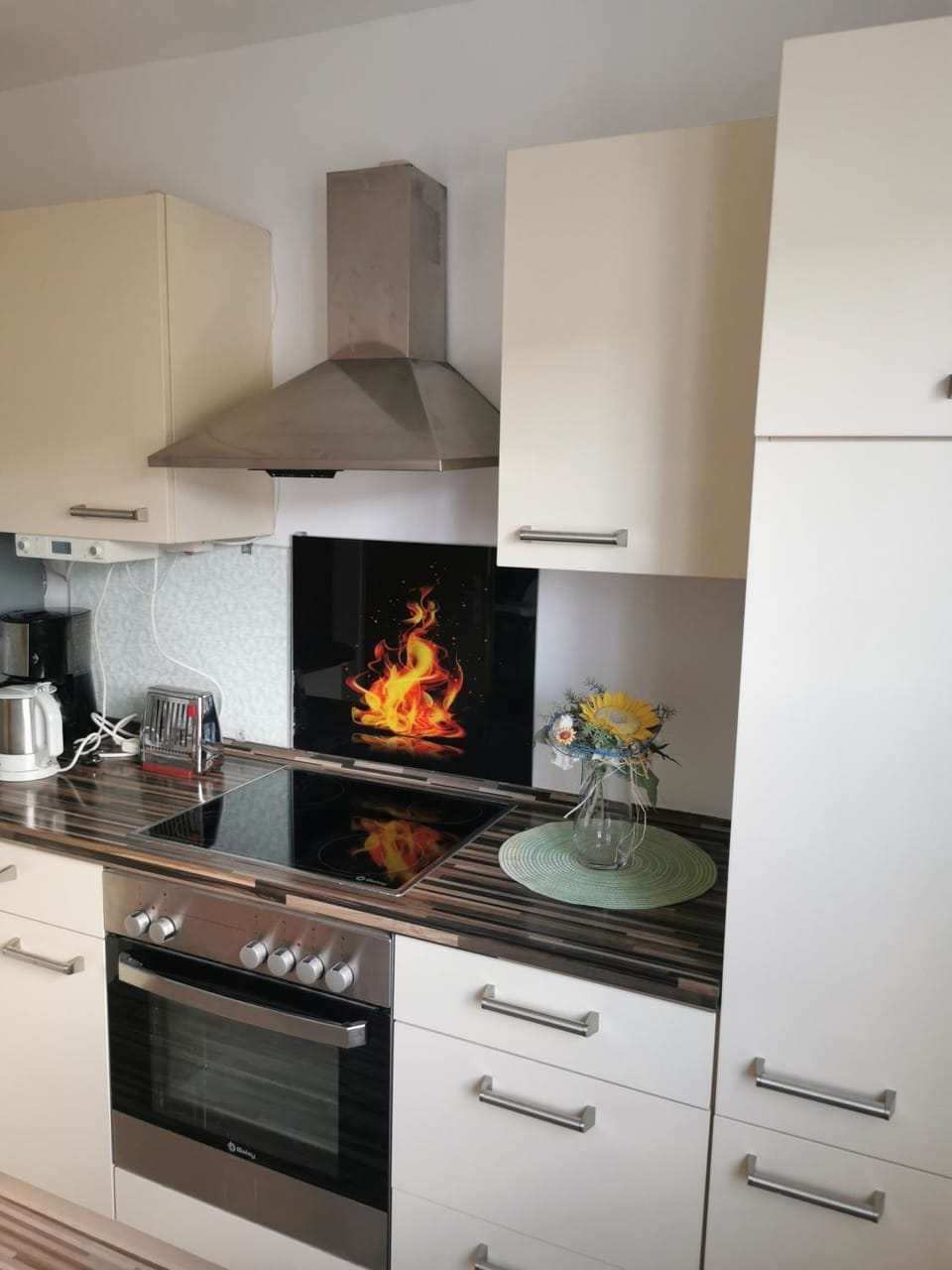 Kitchen or kitchenette, stove