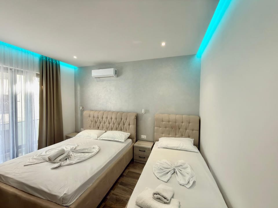 Bed, Photo of the whole room, Bedroom, towels, air conditioner