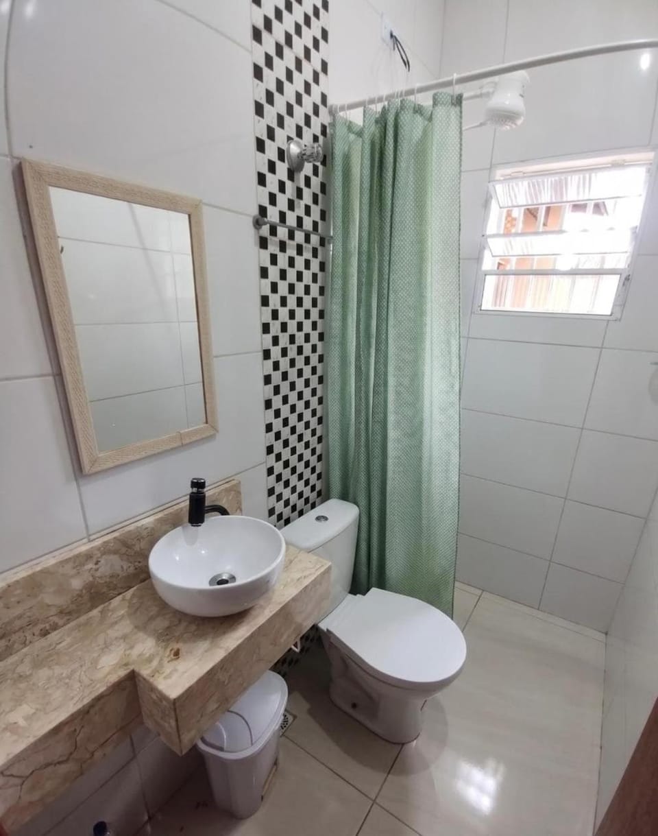 Casa com piscina até 15 pessoas com churrasqueira House in Itanhaém