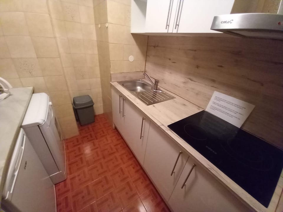 Kitchen or kitchenette, stove