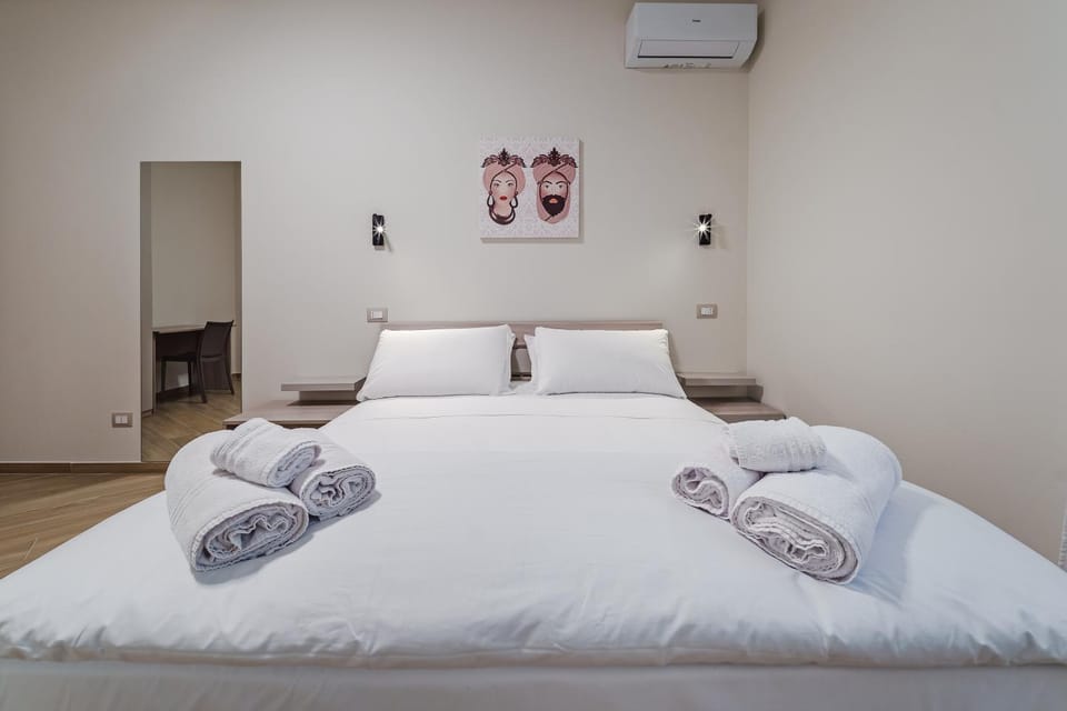 Bed, Photo of the whole room, Bedroom, towels, air conditioner