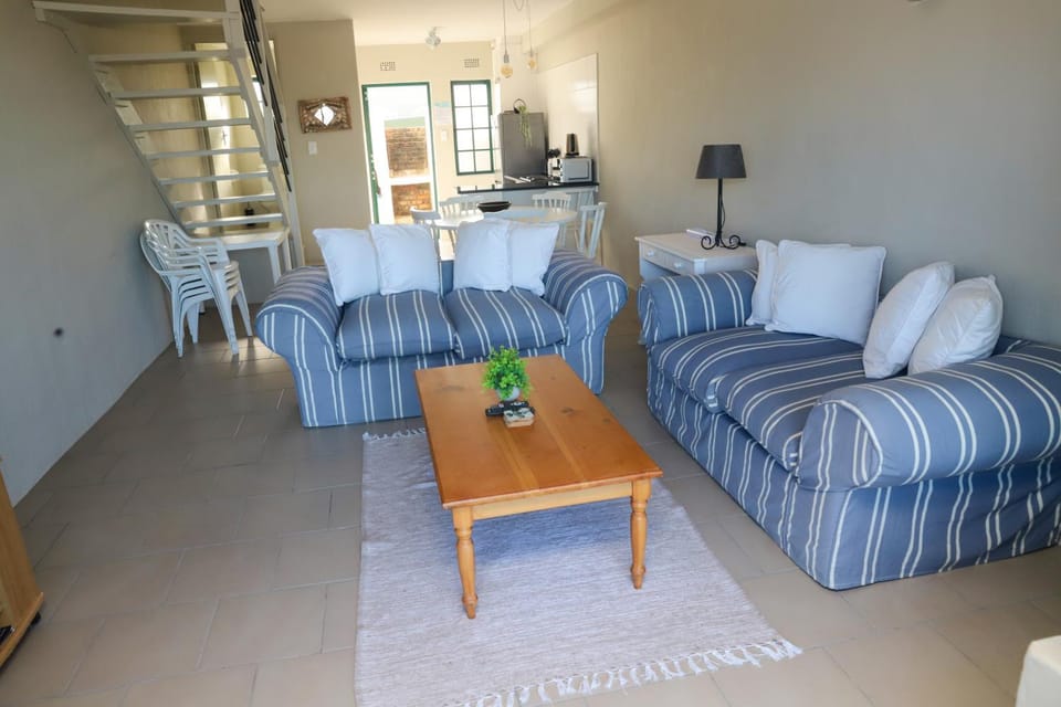 Property building, Living room, Seating area, Dining area, Sea view