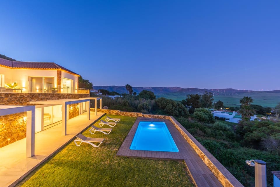 Property building, Natural landscape, Mountain view, Pool view, Sea view, Swimming pool, sunbed