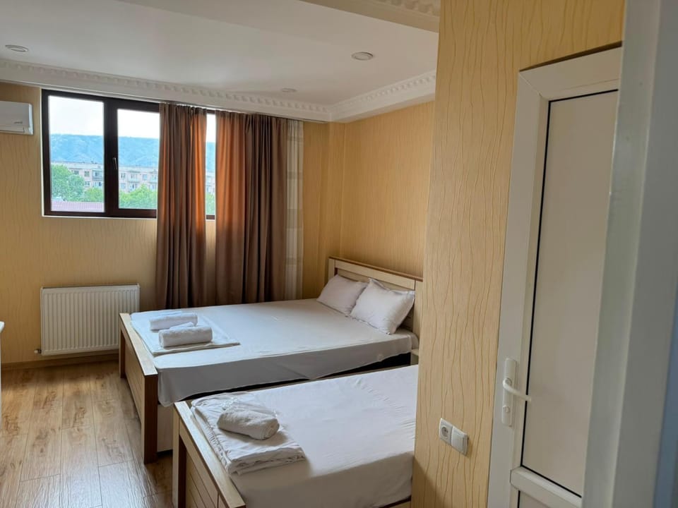 Communal lounge/ TV room, Bed, TV and multimedia, Photo of the whole room, Bedroom, internet, towels, wardrobe, air conditioner