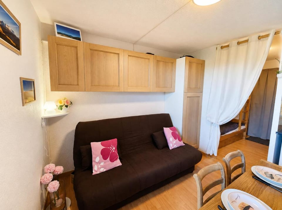 Bed, Living room, Seating area, storage, wardrobe