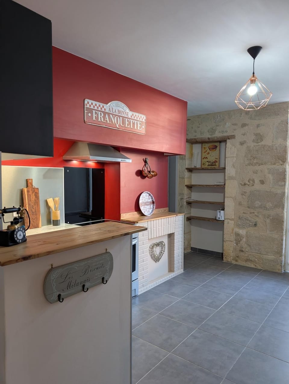 Kitchen or kitchenette, dishwasher, oven, stove