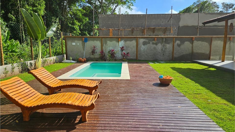 Swimming pool, sunbed