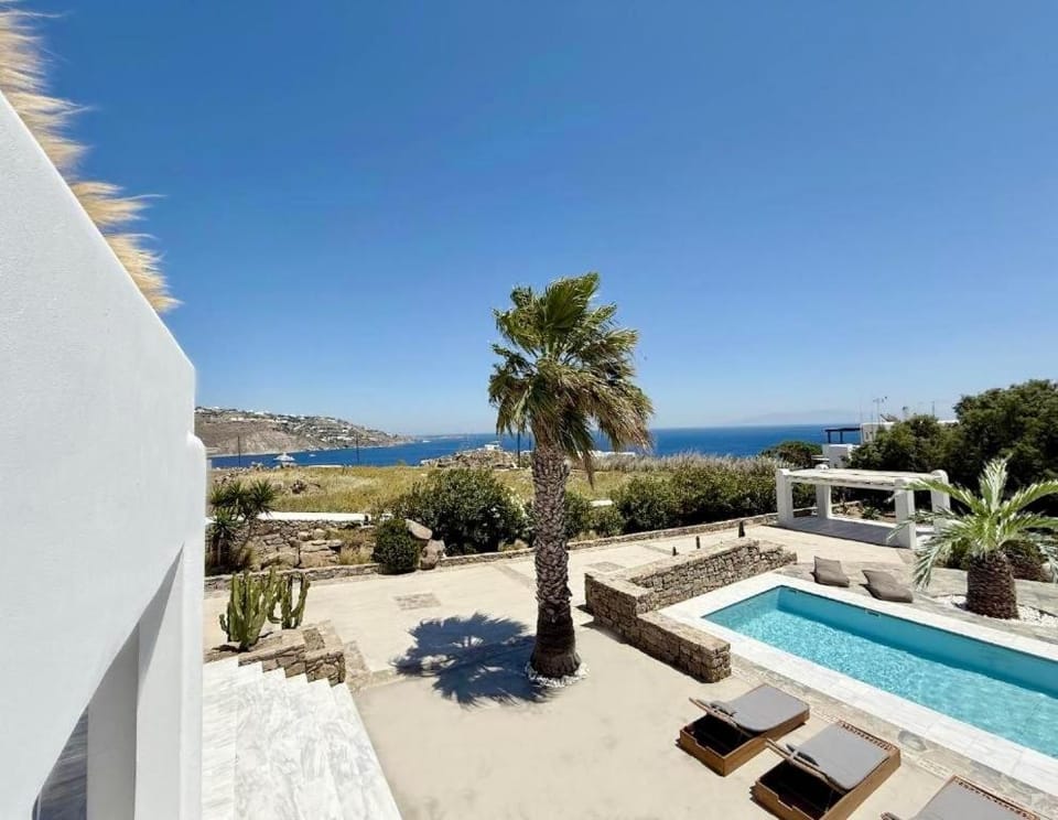 Property building, Patio, Day, Natural landscape, View (from property/room), Balcony/Terrace, Mountain view, Pool view, Sea view, Swimming pool, sunbed